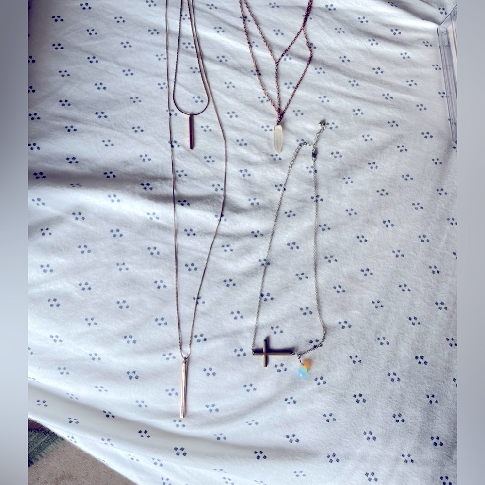 Bundle of unique, layered necklaces.
